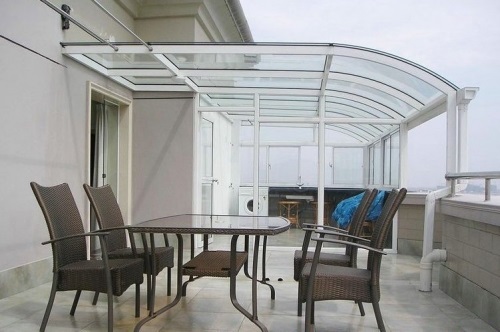 钢化玻璃遮雨棚-成都青望园林景观设计公司